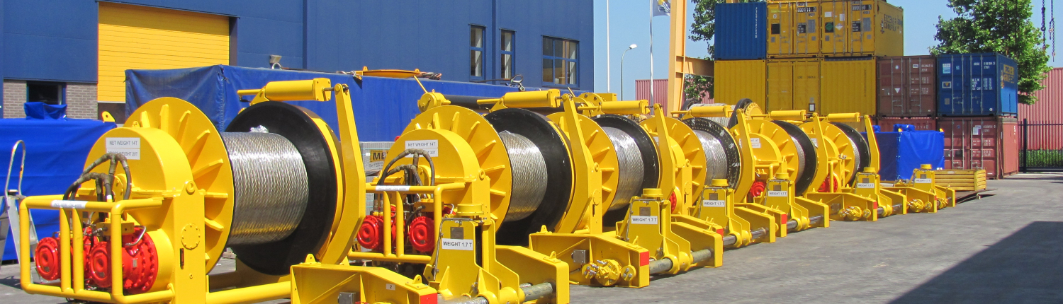 Yellow drum winch with wire at factory