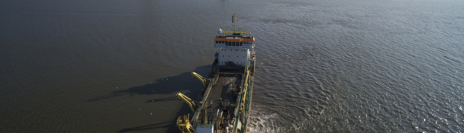 Boat in elbe river for pipe removal project